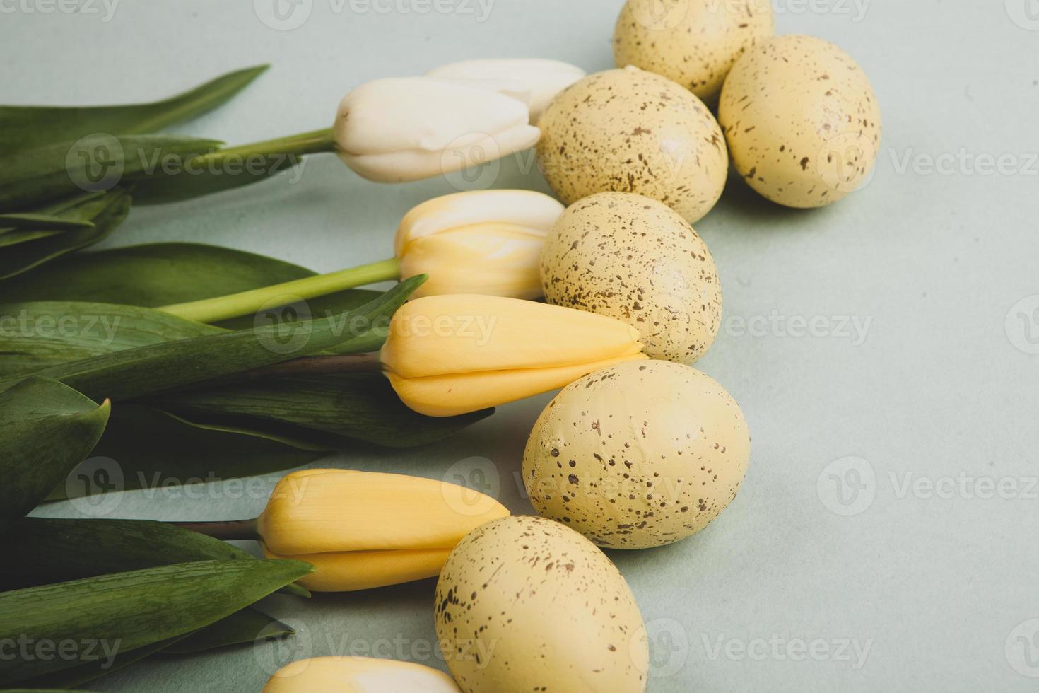 Hand painted pastel colored Easter eggs background. Happy Easter greeting card or invitation. photo