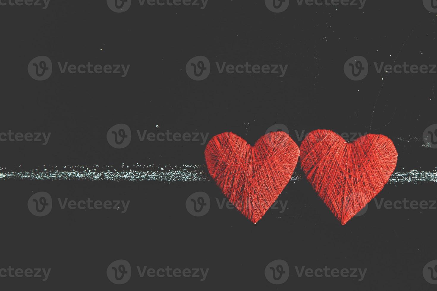 Love hearts on wooden texture background. Valentines day card concept. Heart for Valentines Day Background. photo