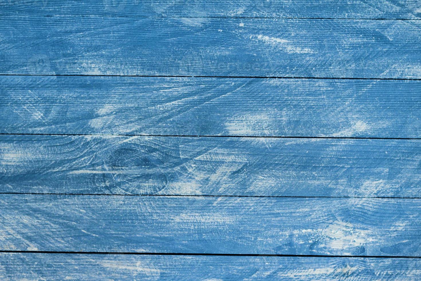 Vintage blue wood background texture with knots and nail holes. Old painted wood wall. Blue abstract background. Vintage wooden dark blue horizontal boards. photo