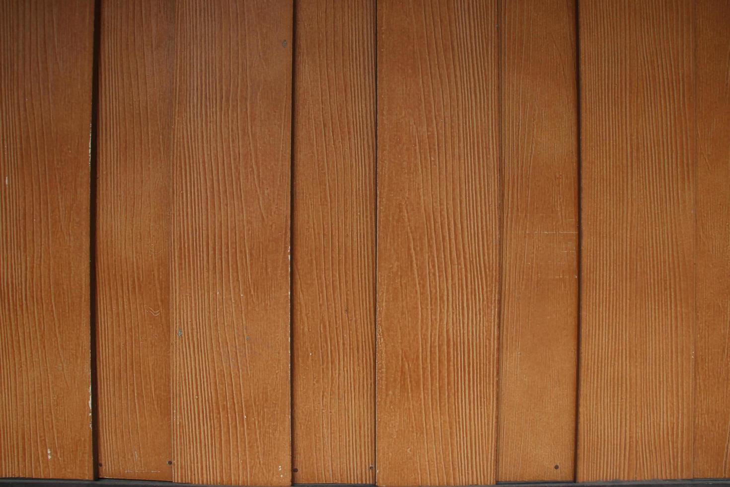 Orange wood plate, vertical. photo