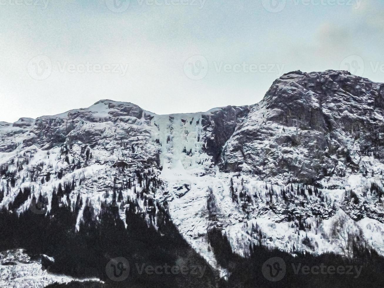 Frozen waterfall Hydnefossen veslehodn mountain in Hemsedal, Norway. photo