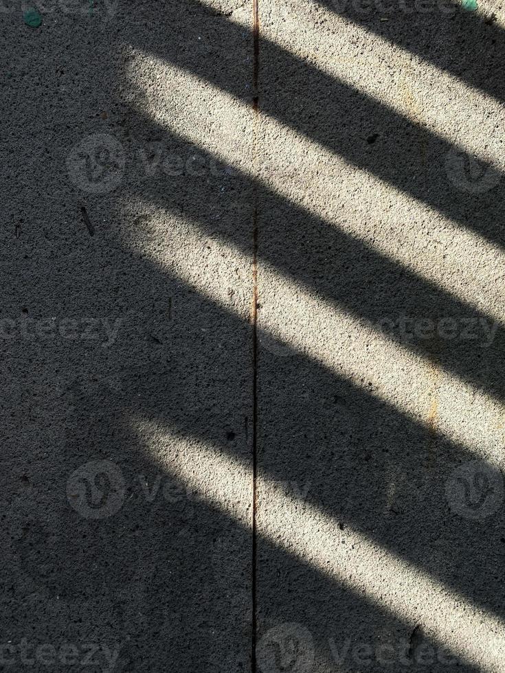 Shadows on concrete. Gray background photo