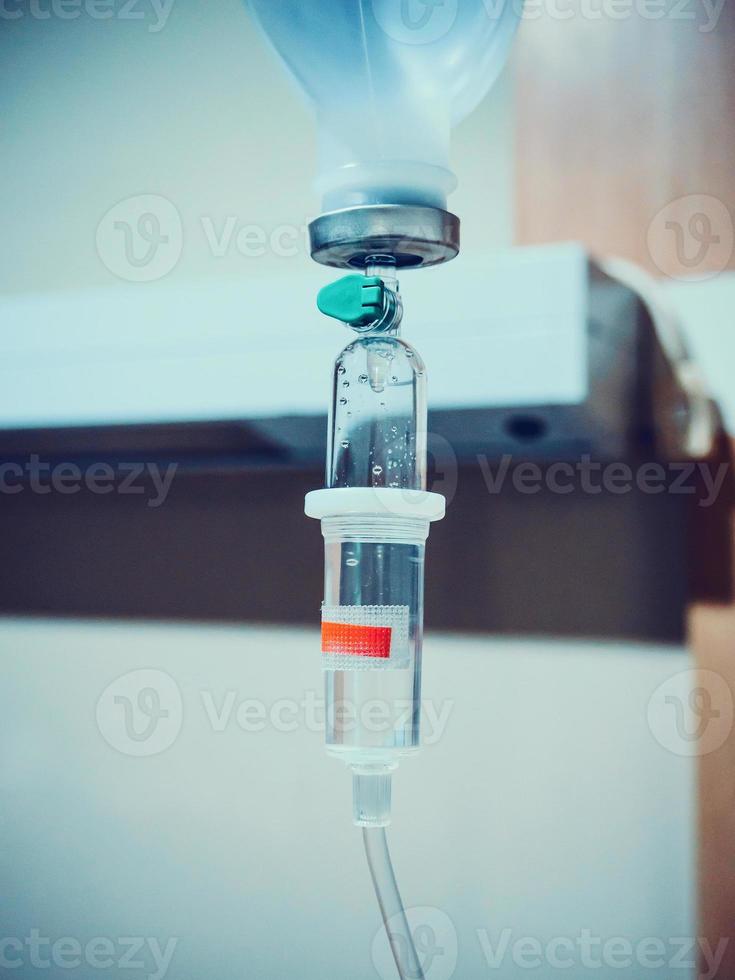 Medical intravenous IV drip in hospital photo