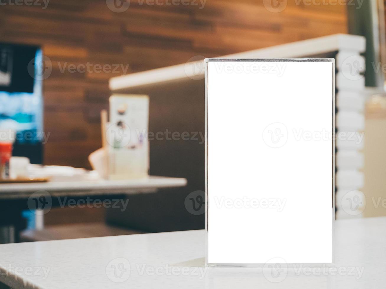 Blank Menu frame on Table in cafe restaurant photo