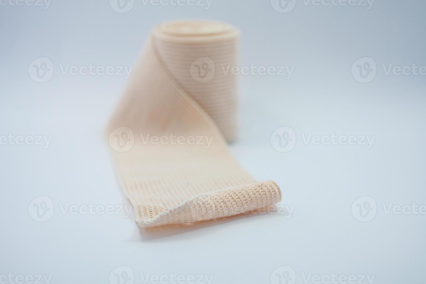 Elastic bandage on white background photo