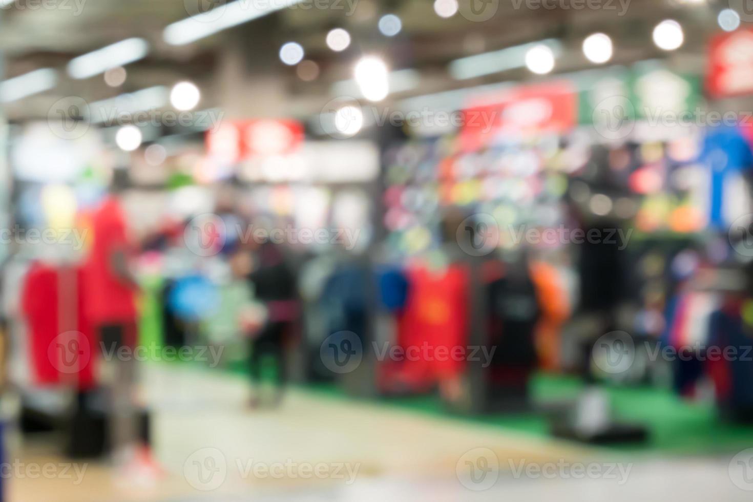 departamento de tienda de ropa deportiva borrosa foto