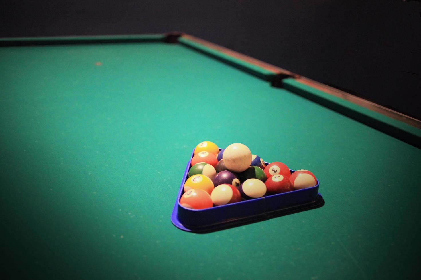 Pool balls on the pool table photo