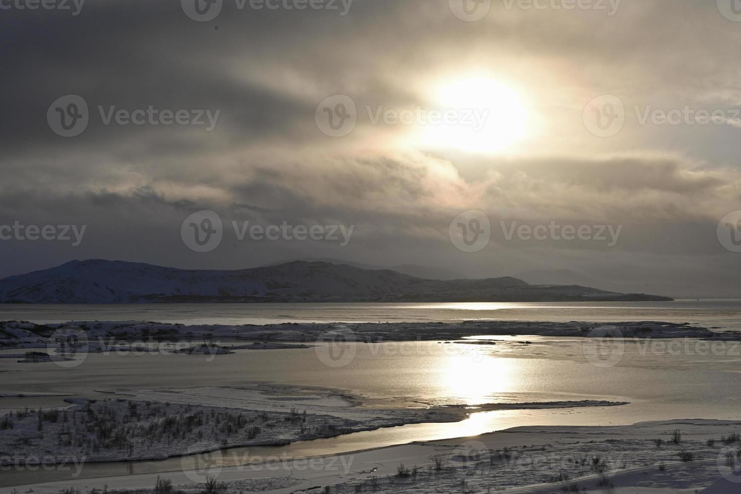 Icelandic lake in nature reserve at sundown photo