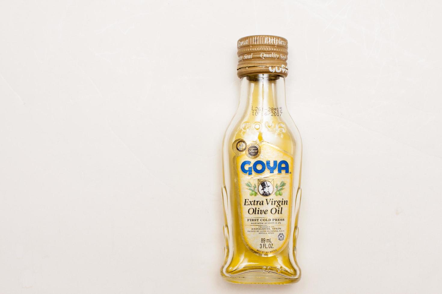 Miami Florida, April 6 2022 A small bottle of Goya Olive Oil photo