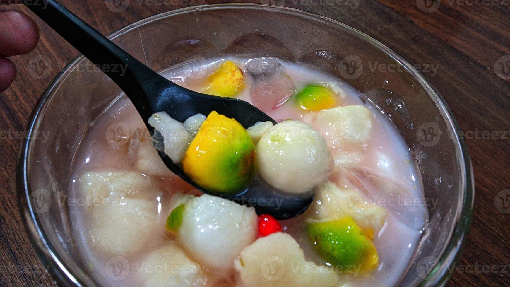 Cianjur Regency, West Java, Indonesia on April 7, 2022 - Fruit Sop which is usually a complementary drink. photo
