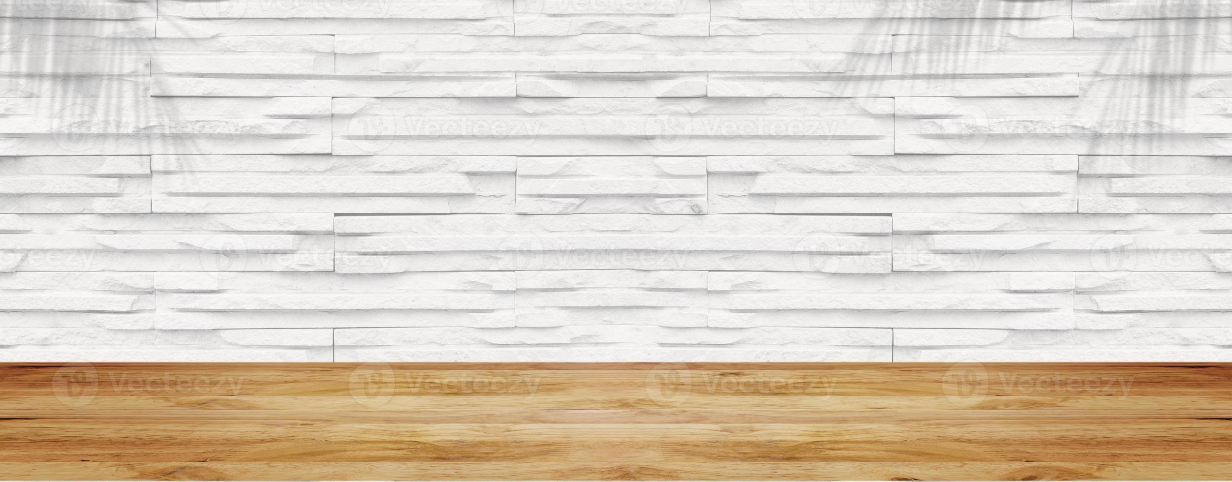 Empty wood table with white stone wall texture background. For display or montage your products. photo