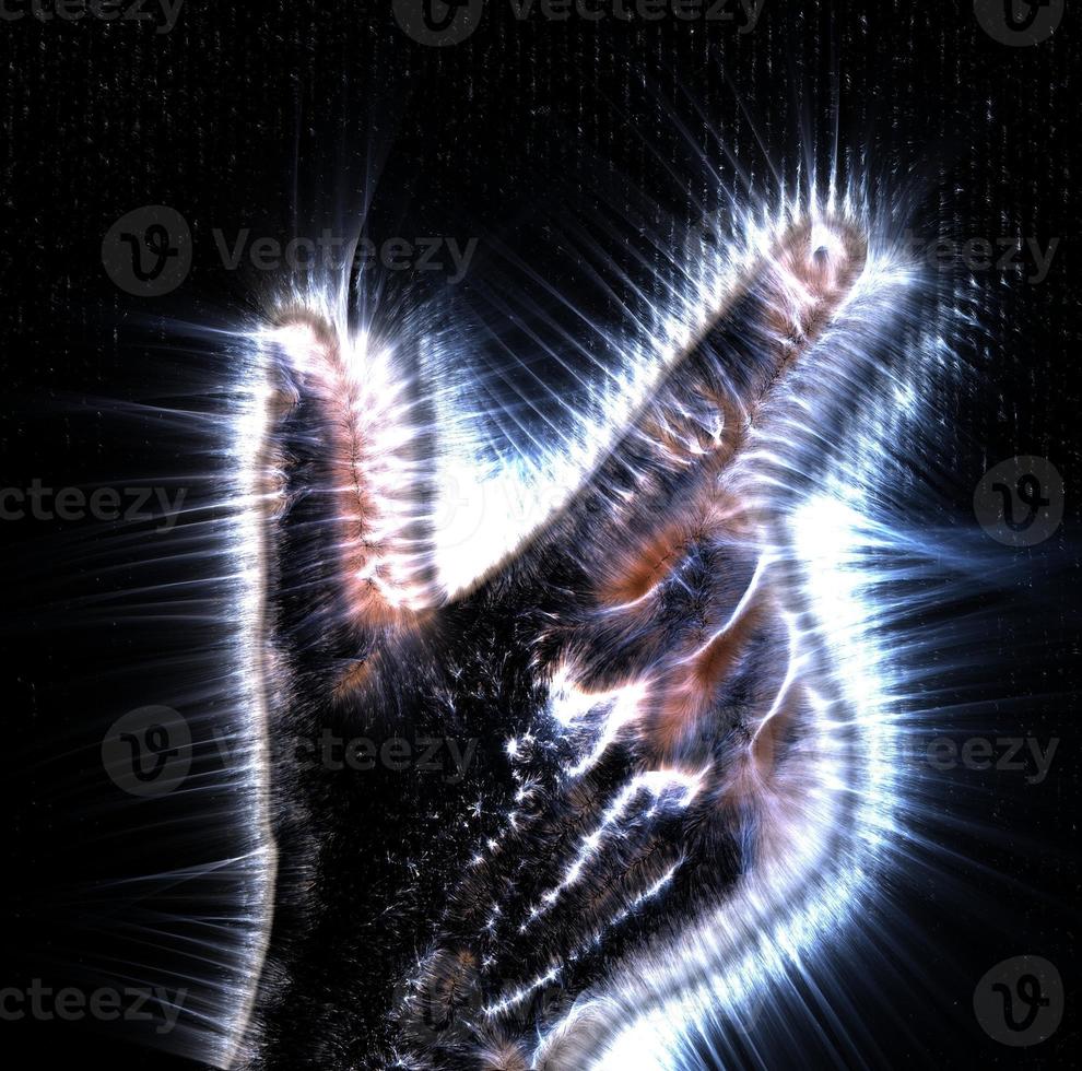 3D-Illustration of a glowing human female hand with a kirlian aura showing different symbols photo