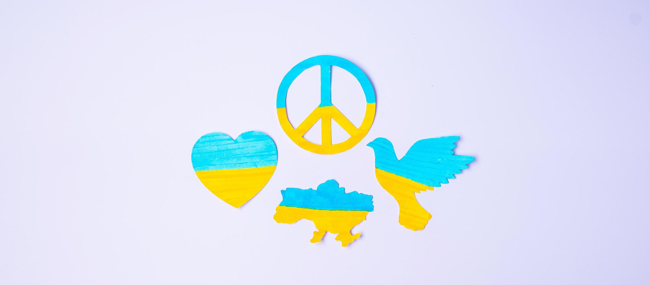 Support for Ukraine in the war with Russia, symbol of peace with flag of Ukraine. Pray, No war, stop war, stand with Ukraine and Nuclear Disarmament photo