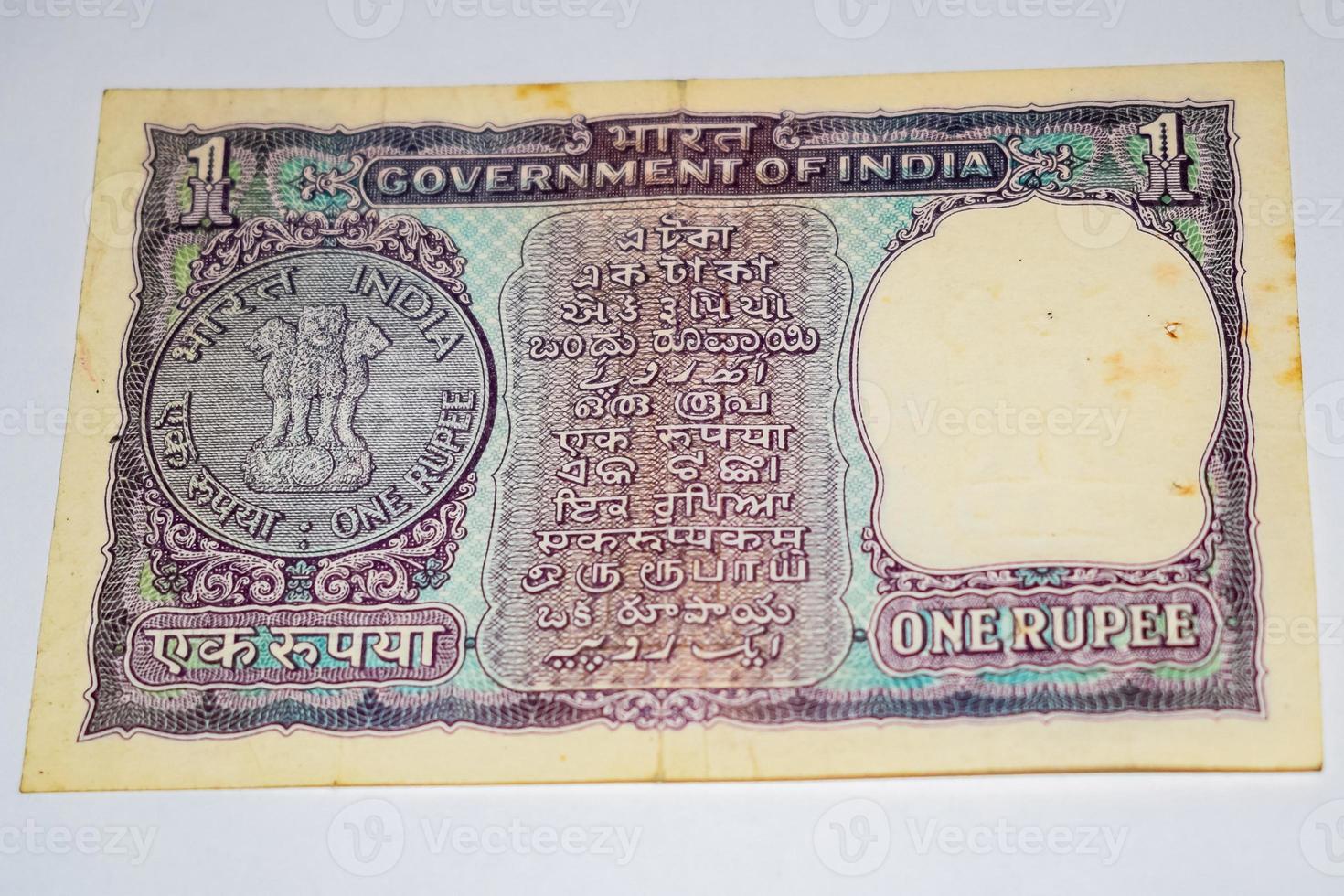 Rare Old Indian One rupee currency note on white background, Government of India one rupee old banknote Indian currency, Old Indian Currency note on the table photo
