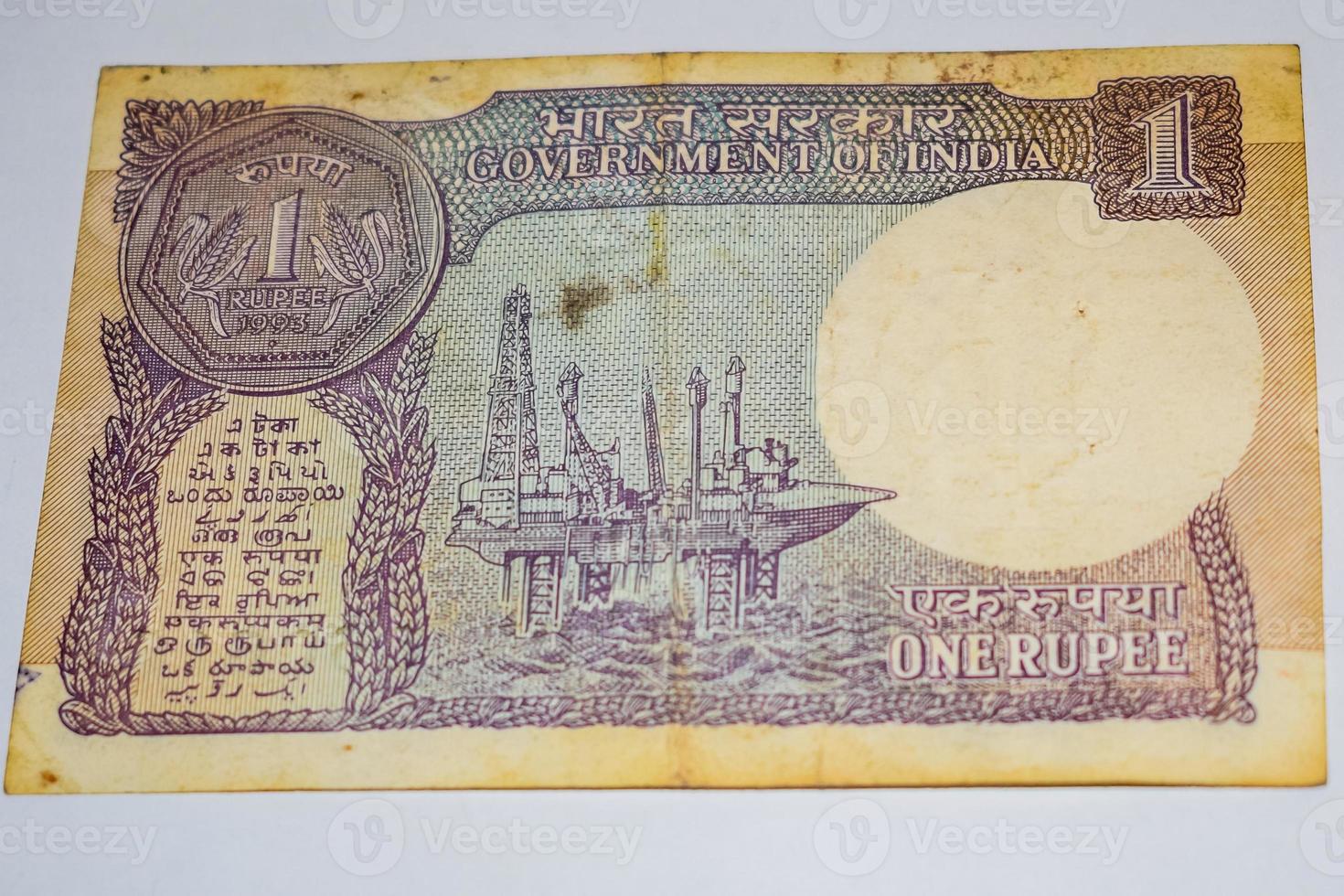 Rare Old Indian One rupee currency note on white background, Government of India one rupee old banknote Indian currency, Old Indian Currency note on the table photo