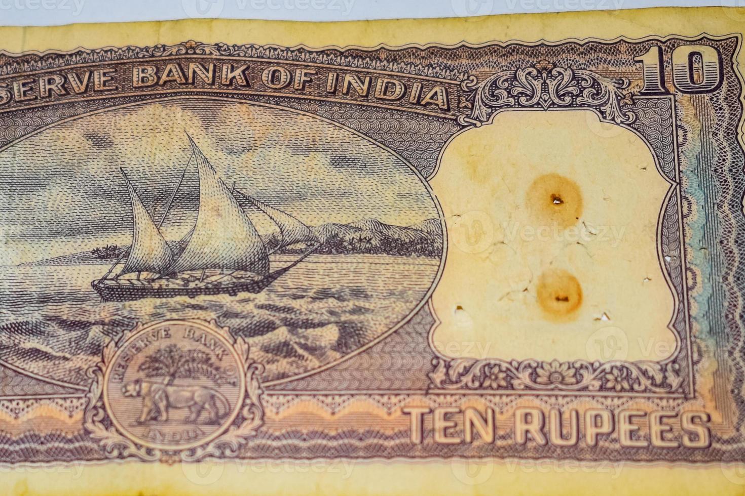 Close up view of rare ten rupee note on the table, Old Indian Currency notes on a rotating table, Rare Indian Currency close up view photo