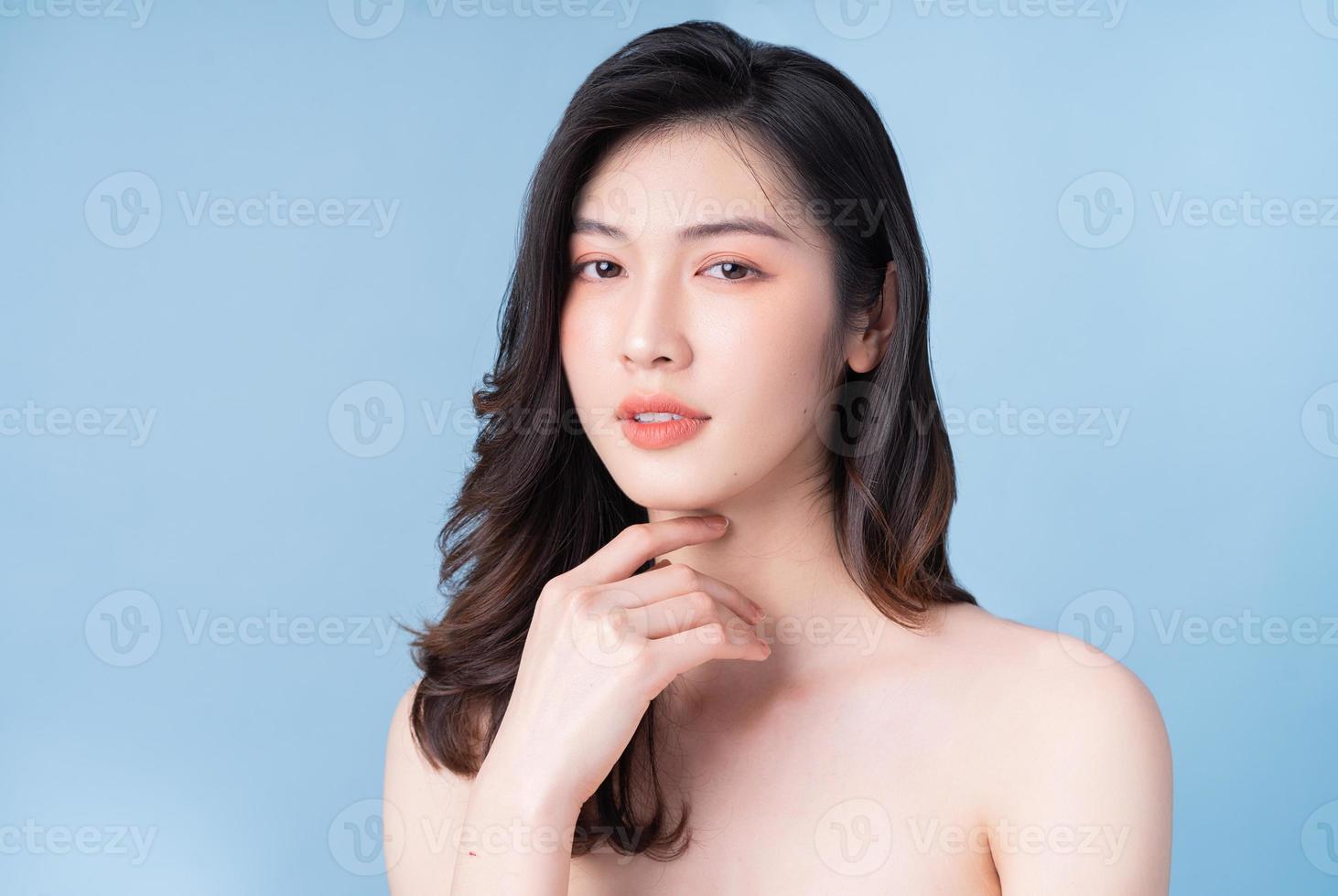 Attractive young Asian woman with fresh skin. Face care, facial treatment, , woman beauty skin isolated on white background. cosmetology, beauty skin and cosmetic concept photo