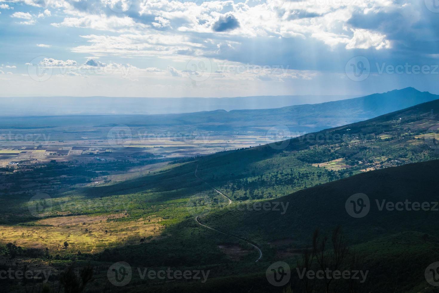 Train snaking through hills in Kenya photo