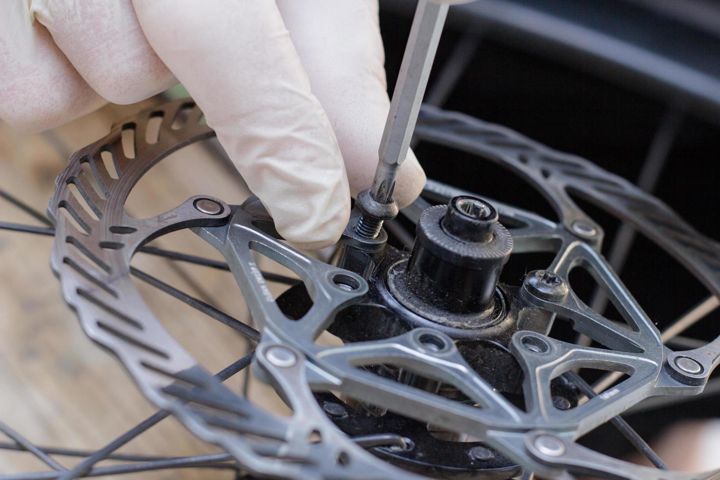 bicycle repair and cleaning process, cycle parts close up, bike workshop photo