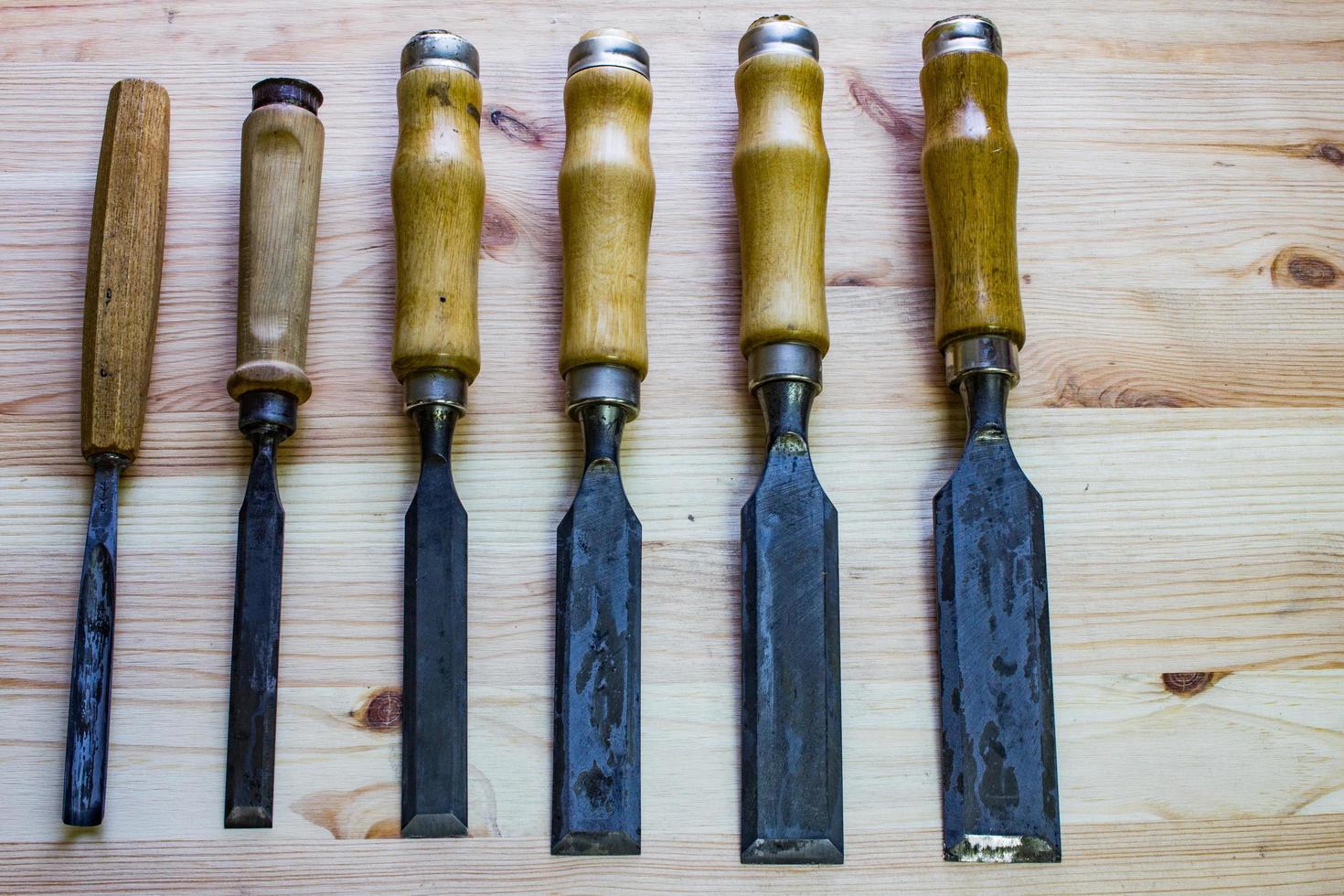 Close up of  carpenter tools on the table in wokshop, woodworking tools photo