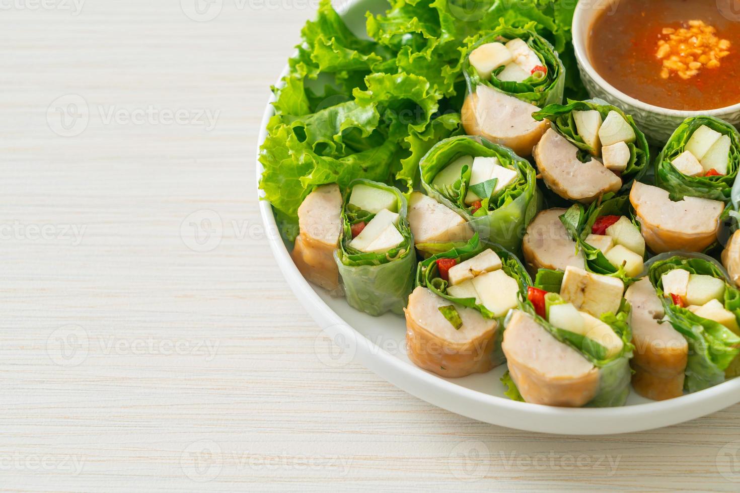 Vietnamese meatball wrap or Vietnamese salad roll or Namnueng or Nem Nuong photo