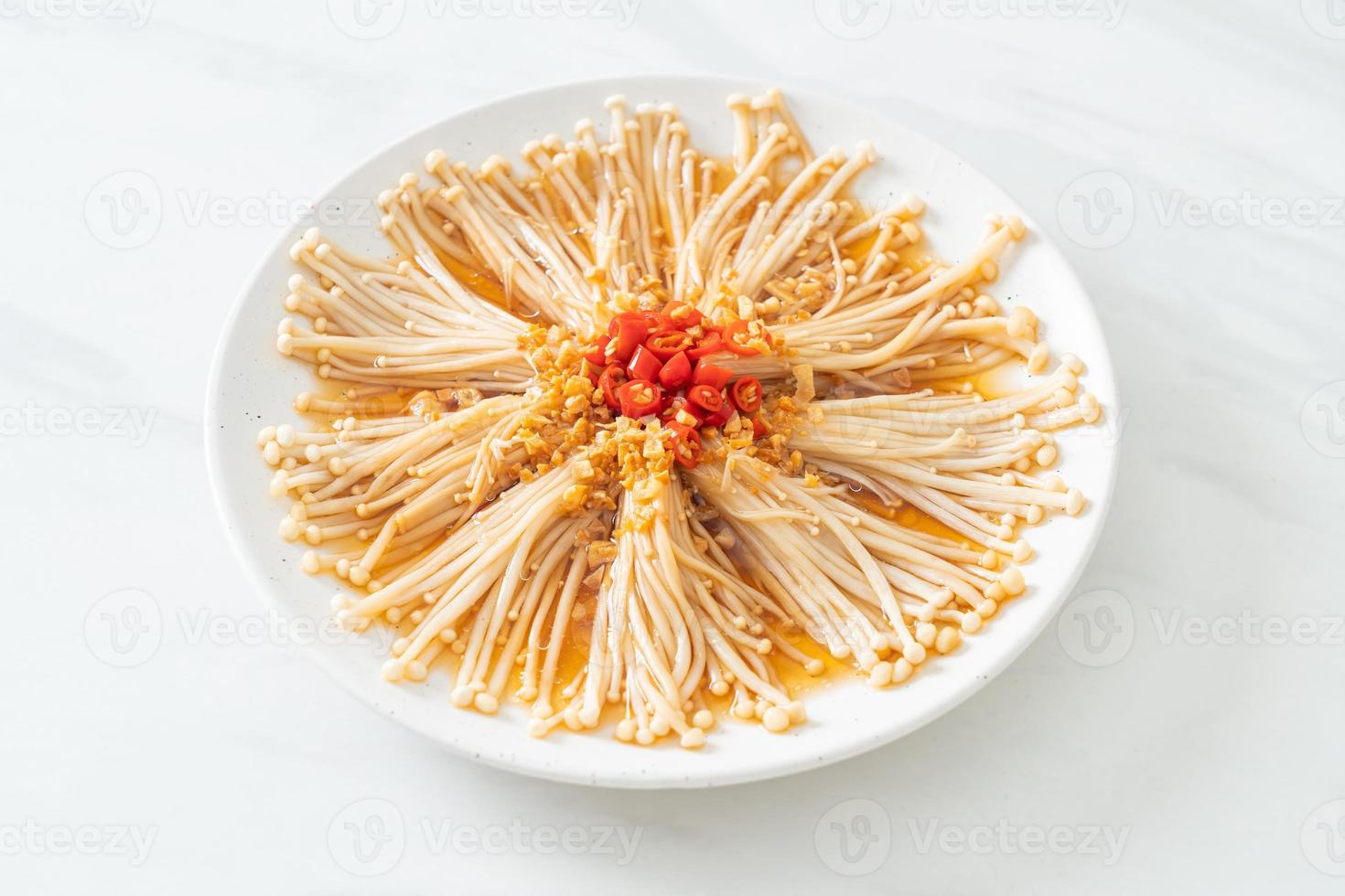 steamed golden needle mushroom or enokitake with soy sauce, chilli and garlic photo