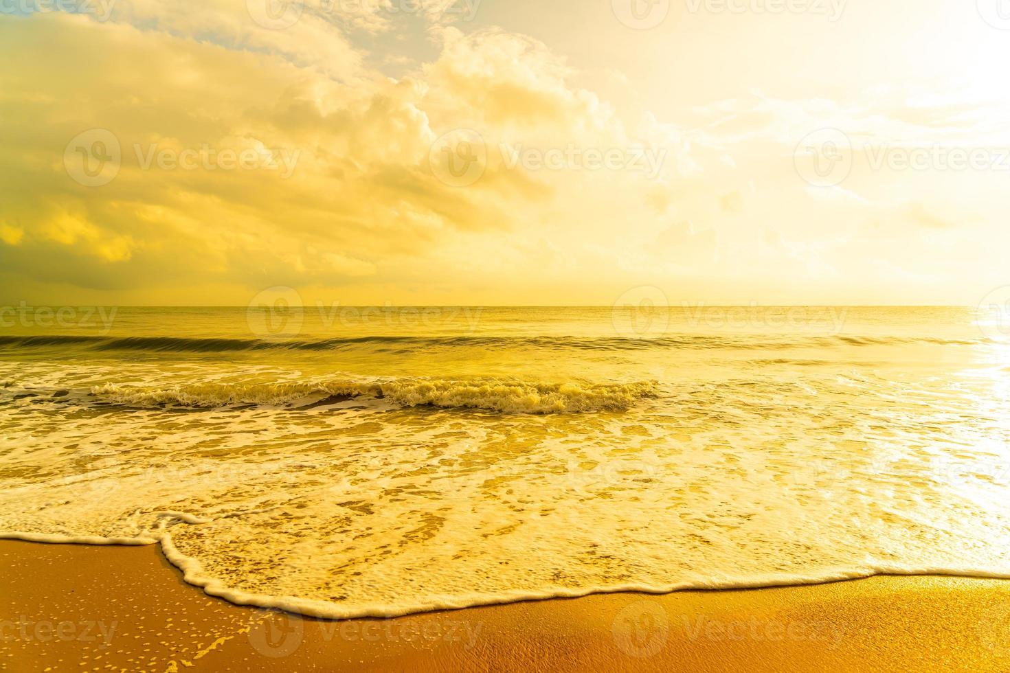 beautiful beach sea at sunrise or sunset time photo