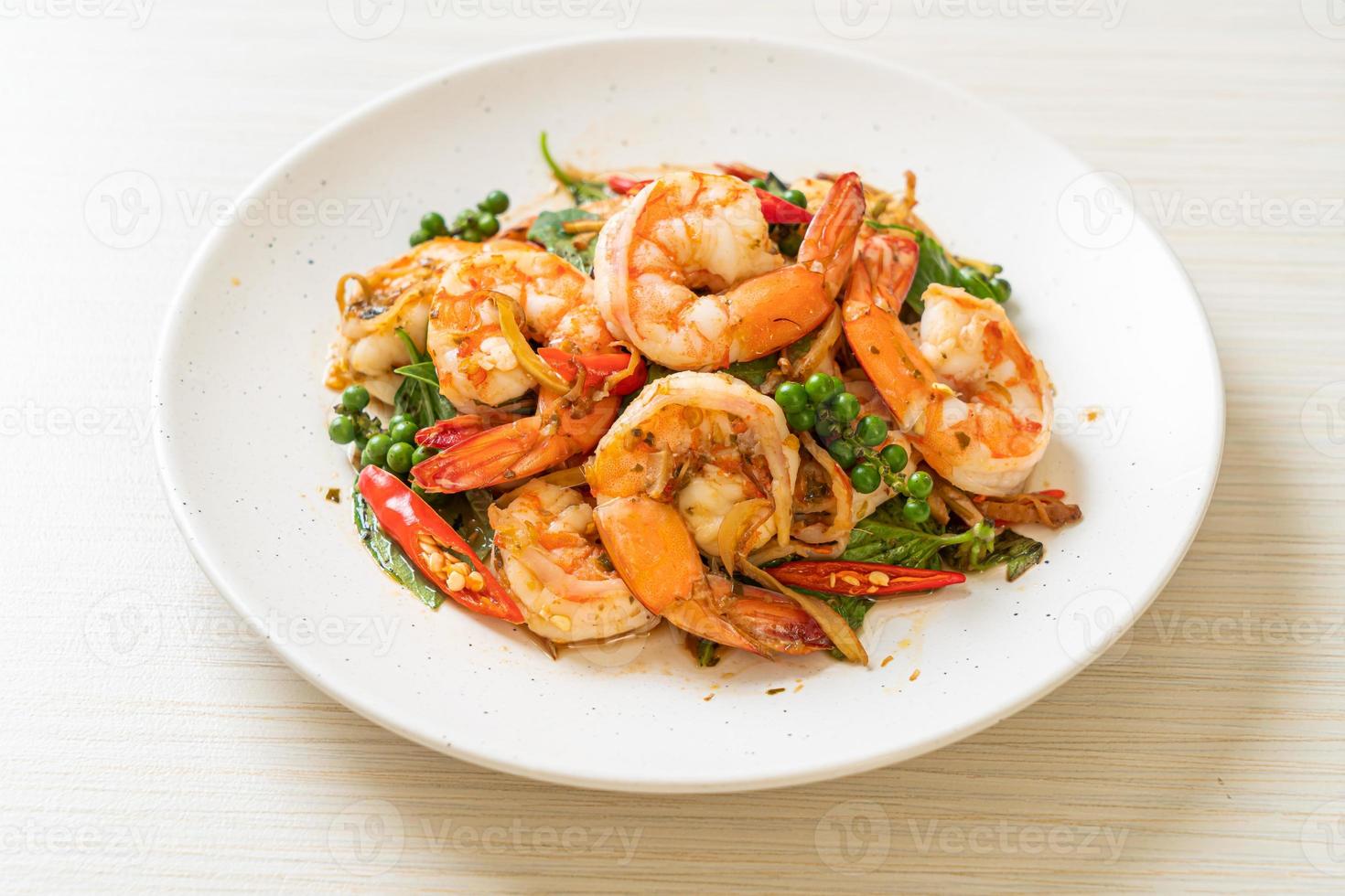 stir fried holy basil with shrimps and herb photo