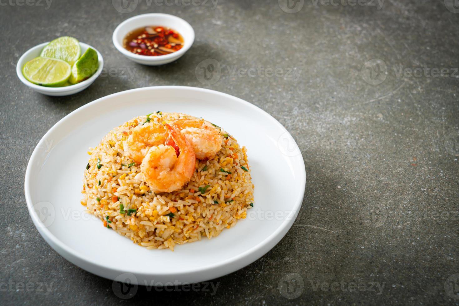 fried shrimps fried rice on plate photo