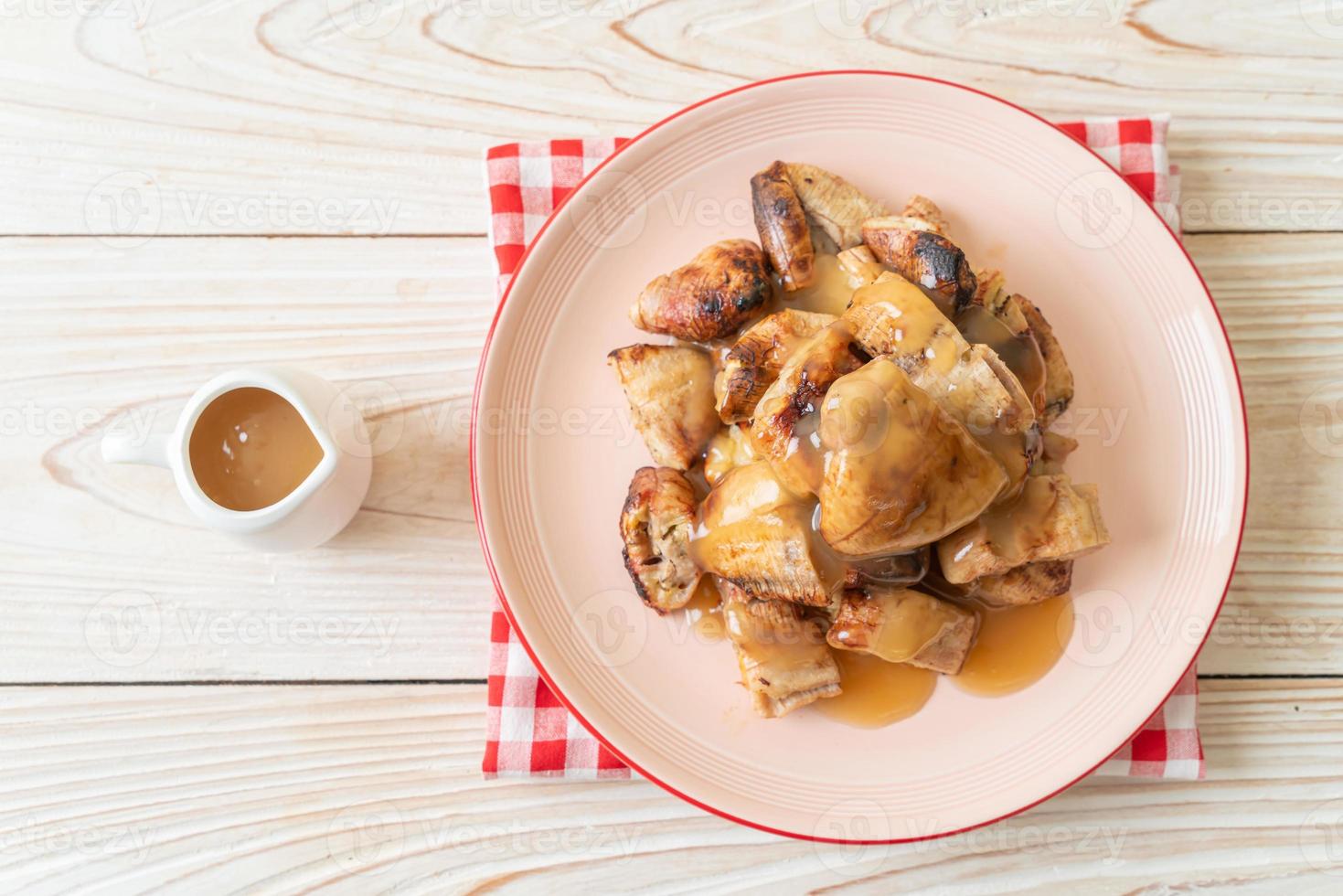 grilled bananas with coconut caramel sauce 7060601 Stock Photo at Vecteezy