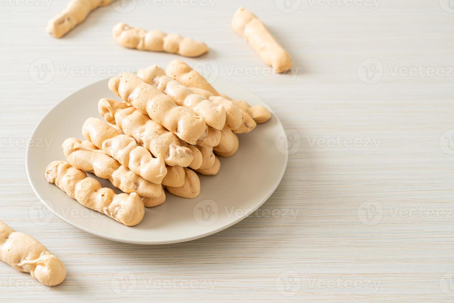 almonds meringue stick on plate photo