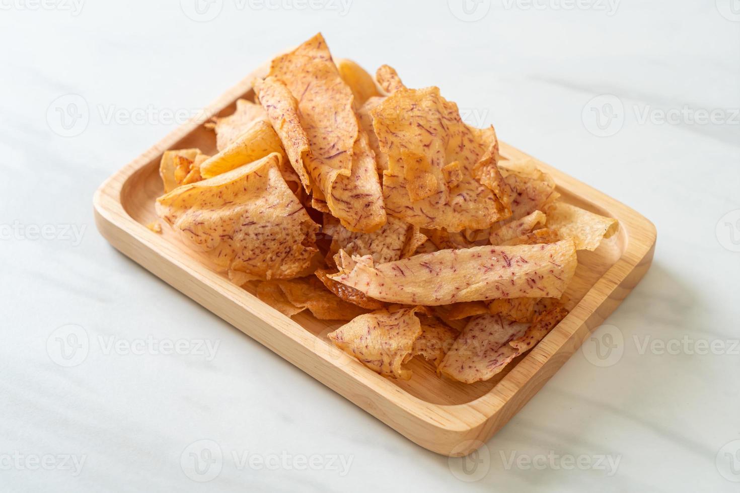 Taro Chips - fried or baked sliced taro photo