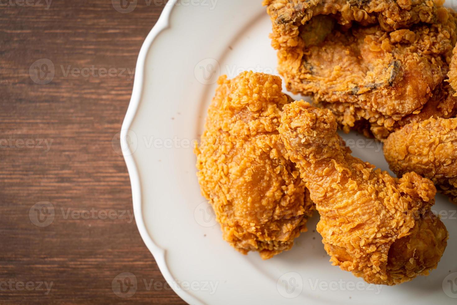 fried chicken with ketchup on plate photo