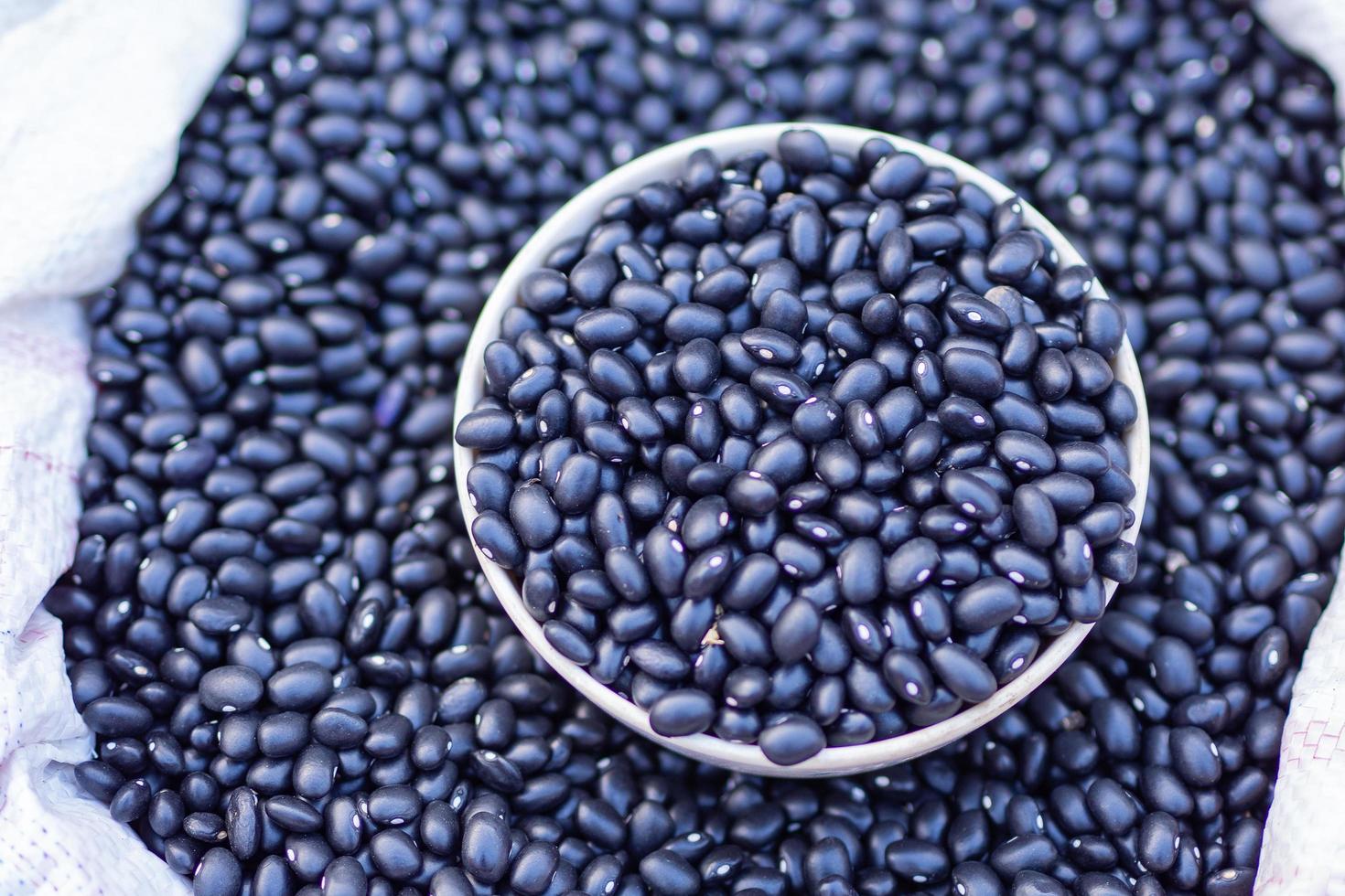 Close-up of grains black bean for sale in the market photo