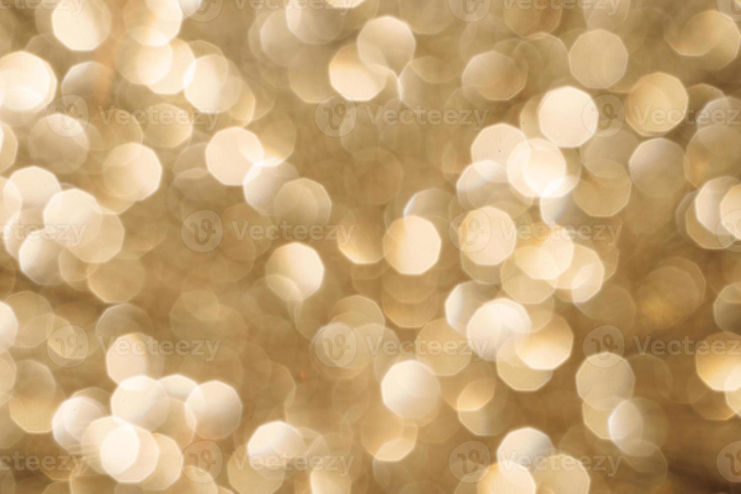 Golden sparkle background with beautiful bokeh photo