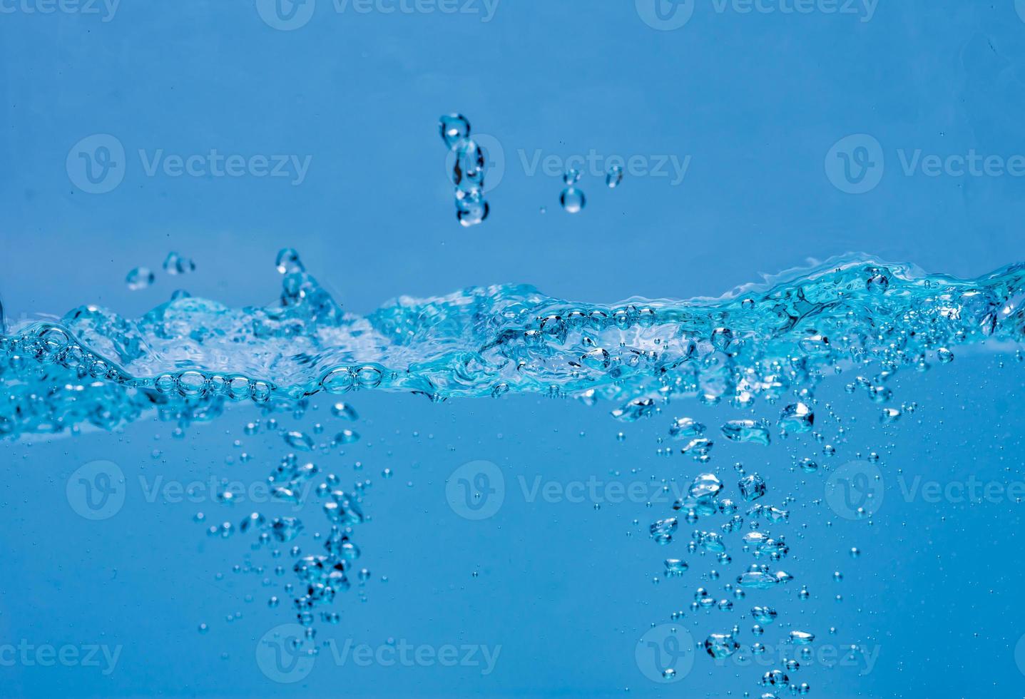 Water and air bubbles over white background with space for text photo