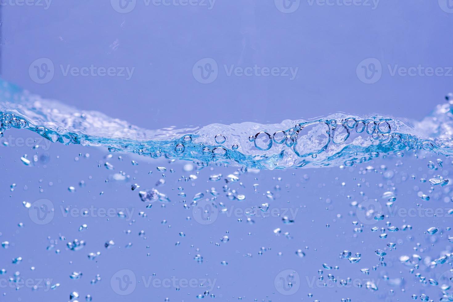 Water and air bubbles over white background with space for text photo