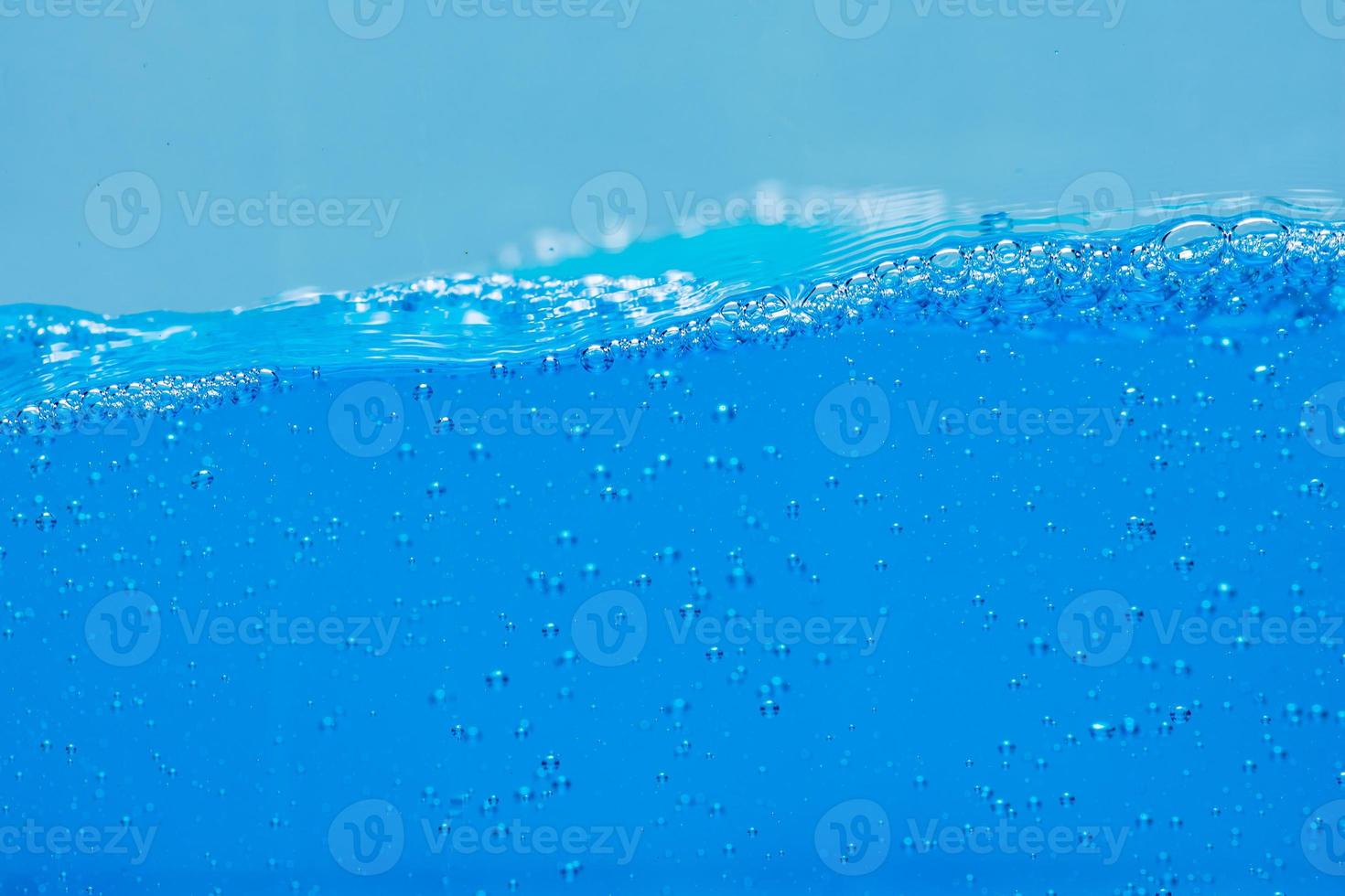 Water and air bubbles over white background with space for text photo