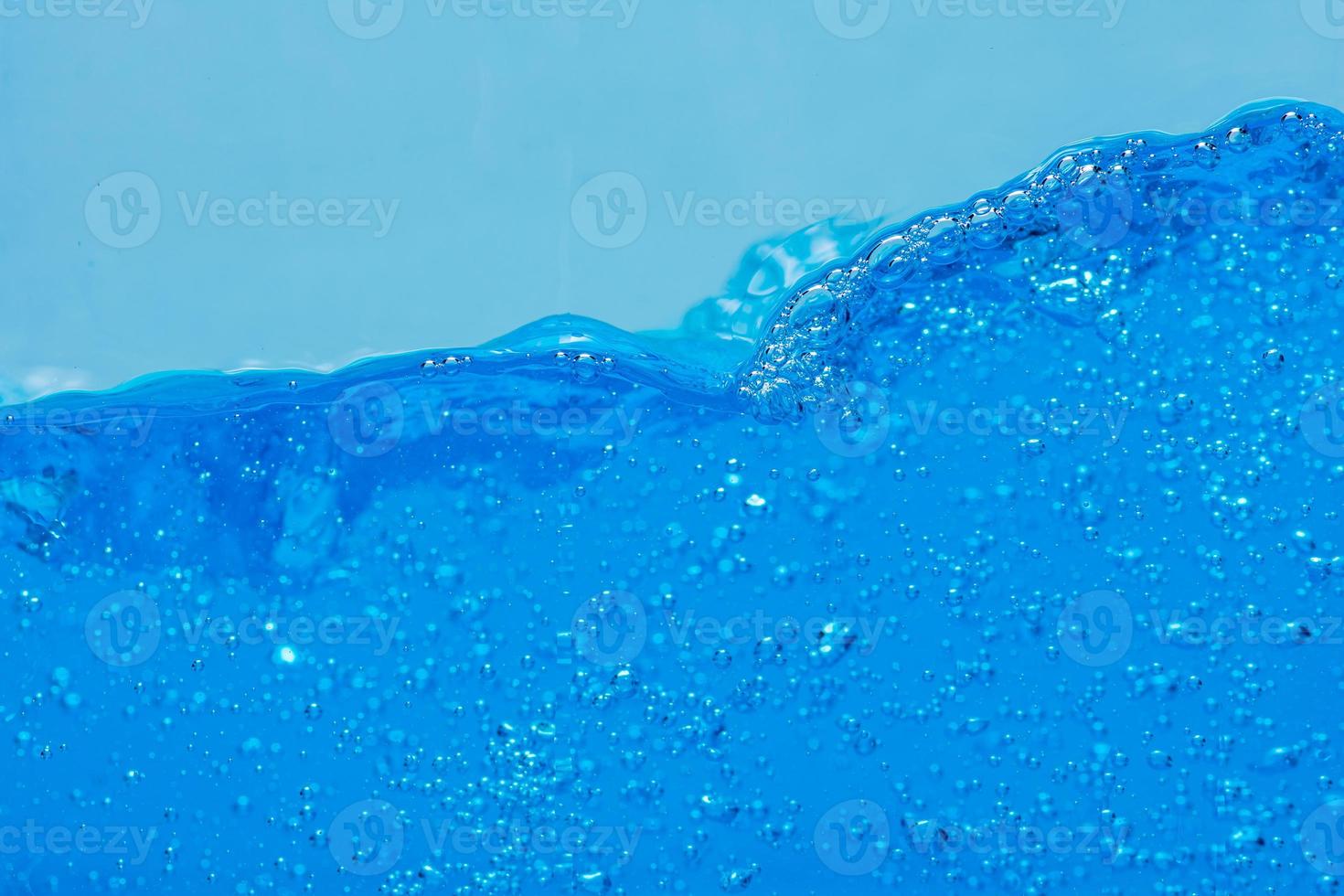 Water and air bubbles over white background with space for text photo