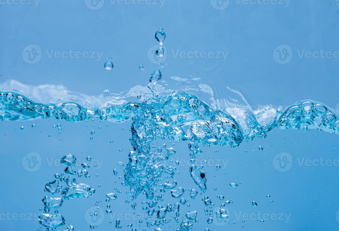 Water and air bubbles over white background with space for text photo