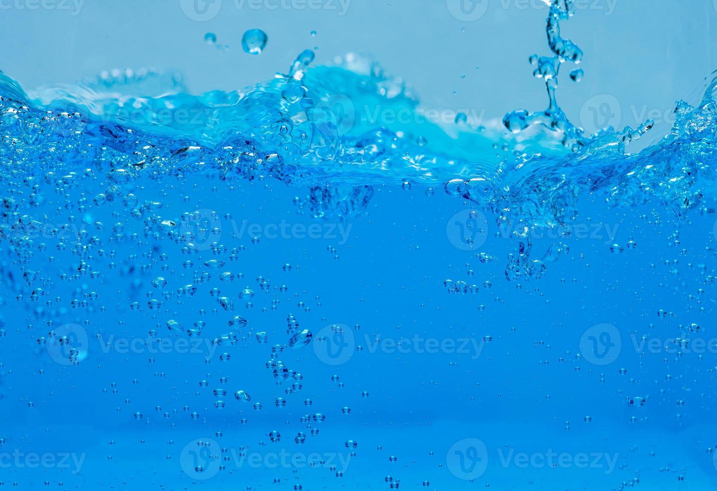 Water and air bubbles over white background with space for text photo