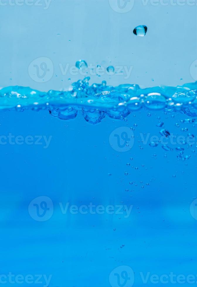 Water and air bubbles over white background with space for text photo