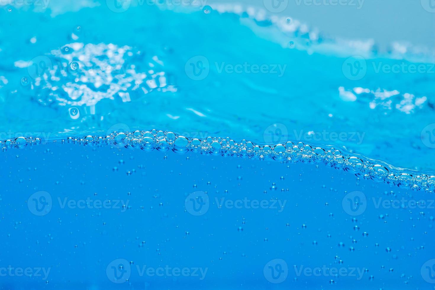 Water and air bubbles over white background with space for text photo