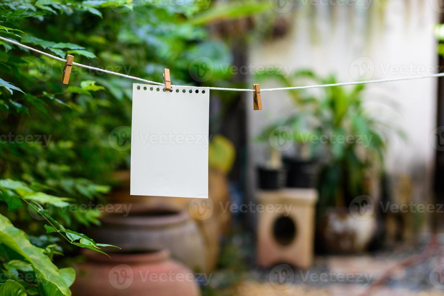 Wood, paper clip for hanging notes. photo