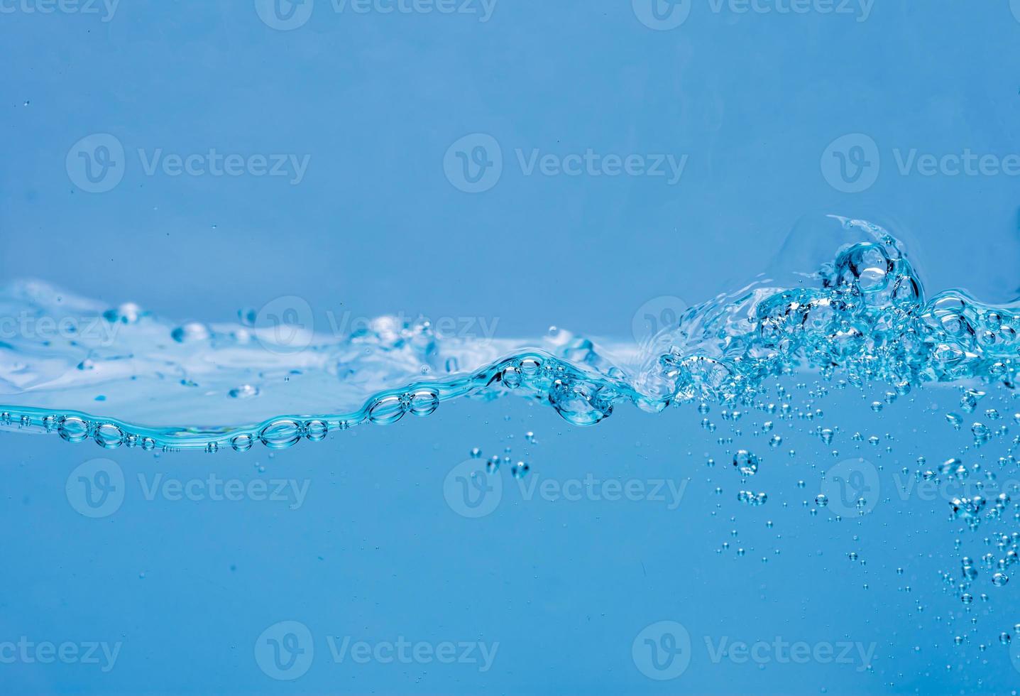 Water and air bubbles over white background with space for text photo