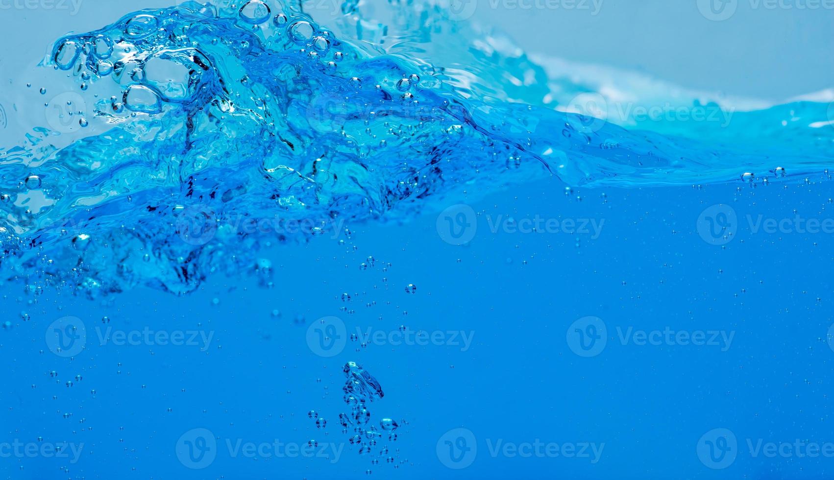 Water and air bubbles over white background with space for text photo