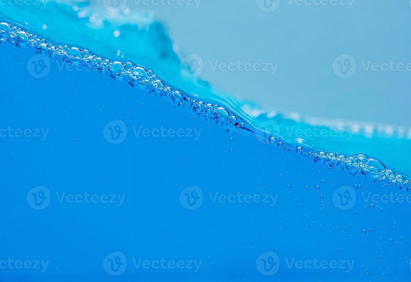 Water and air bubbles over white background with space for text photo