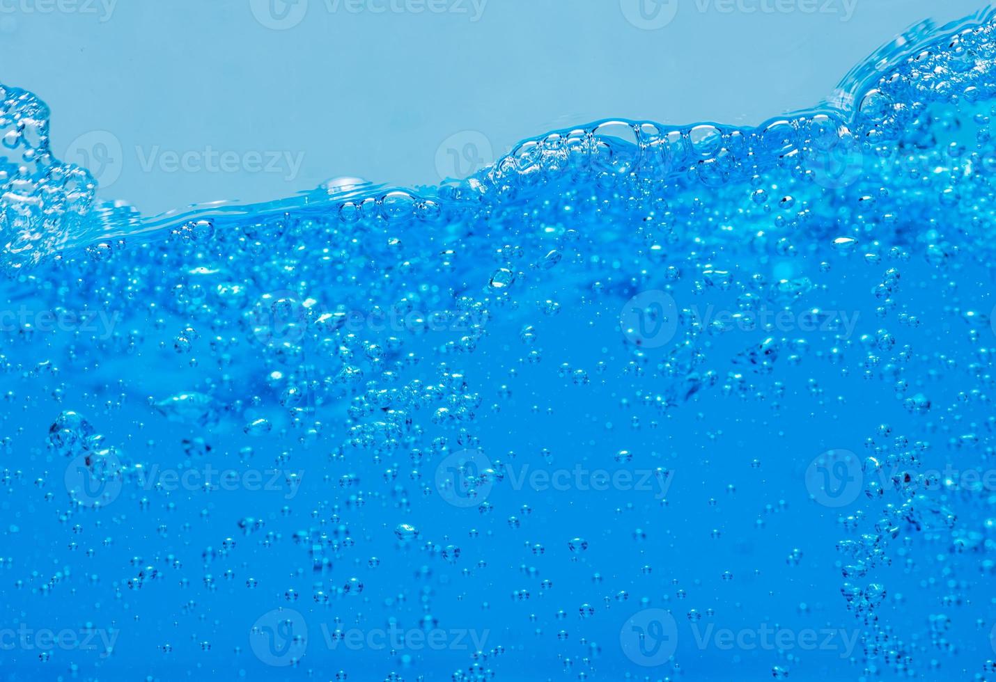 Water and air bubbles over white background with space for text photo