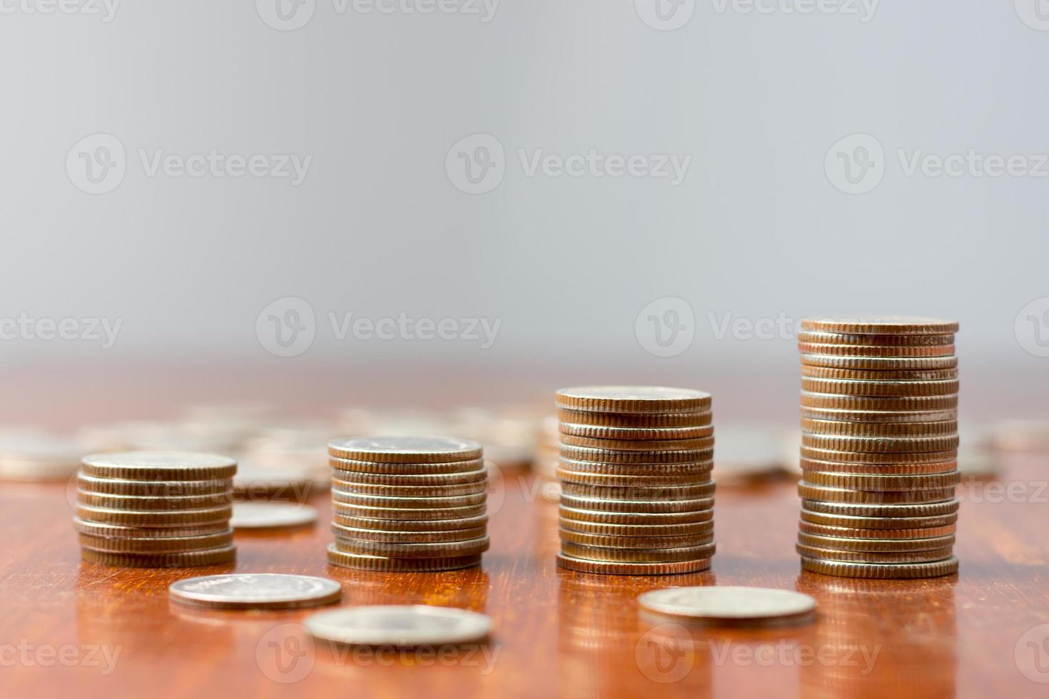 Close up Sort the coins on the table. photo