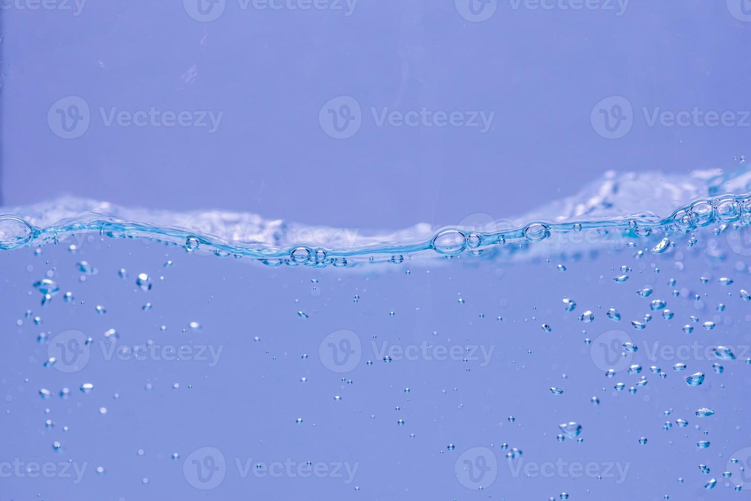 Water and air bubbles over white background with space for text photo